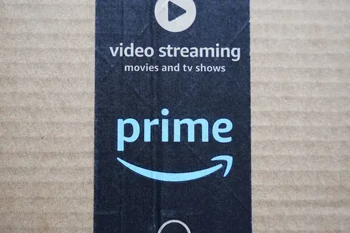 An Amazon Prime cardboard shipping box label is seen on March 17, 2023, in East Derry, N.H. Amazon Prime Day is here. And experts are reminding consumers to be wary of scams. (AP Photo/Charles Krupa, File)