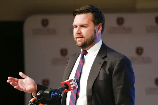 J.D. Vance, a Republican running for an open U.S. Senate seat in Ohio, speaks to reporters following a debate with other Republicans at Central State University in Wilberforce, Ohio, March 28, 2022. Former President Donald Trump is endorsing "Hillbilly Elegy” author JD Vance in Ohio's competitive Republican Senate primary, ending months of jockeying in a race where his backing could be pivotal. (AP Photo/Paul Vernon, File)