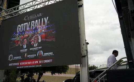 U.S. Rep. Henry Cuellar, D-Laredo, walks to the stage during a campaign event, Wednesday, May 4, 2022, in San Antonio. Cuellar, a 17-year incumbent and one of the last anti-abortion Democrats in Congress, is in his toughest reelection campaign, facing a May 24 primary runoff against progressive Jessica Cisneros. (AP Photo/Eric Gay)