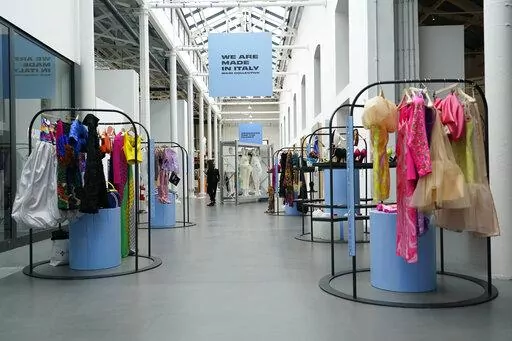 Creations, part of the 'We Are Made in Italy' collecting fashion event are shown during the women's Spring Summer 2023 fashion week, in Milan, Italy, Wednesday, Sept. 21, 2022. Milan Fashion Week opening Wednesday celebrates perhaps its most diverse season ever, abuzz with new creative directors of color at such storied houses as Salvatore Ferragamo and Bally and marking the return of Haitian-Italian designer Stella Jean after a two-year haitus. But Jean and other industry insiders behind a two-