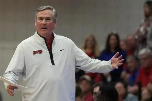 Western Kentucky head coach Rick Stansbury reacts to a referee's call during the second half of an NCAA college basketball game against Florida Atlantic, Jan. 28, 2023, in Boca Raton, Fla. Stansbury has resigned after seven seasons as Western Kentucky’s head coach and cited a need to focus on his health and family. (AP Photo/Rebecca Blackwell, File)
