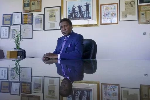 Attorney John Burris poses for photos at his office in Oakland, Calif., Tuesday, Aug. 16, 2022. For nearly 50 years, Burris has poked holes into narratives that did not add up, namely those of law enforcement accused of using excessive force. (AP Photo/Jeff Chiu)