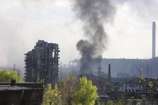 Smoke rises from the Azovstal steel mill in Mariupol, in territory under the government of the Donetsk People's Republic, eastern Ukraine, May 4, 2022. (AP Photo/Alexei Alexandrov, File)