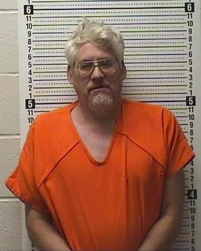 This booking photo provided by Tate County, Miss., Sheriff's Office shows Richard Dale Crum, who was booked into jail on one count of capital murder on Friday, Feb. 17, 2023. Authorities have announced additional charges against Crum, the gunman who they say killed six people in a tiny rural community in northern Mississippi on Friday. (Tate County Sheriff's Office via AP, File)