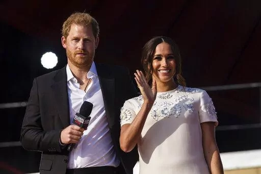Prince Harry and his wife Meghan speak during the Global Citizen festival, on Sept. 25, 2021 in New York. Prince Harry and his wife Meghan have visited Queen Elizabeth II at Windsor Castle on their first joint visit to the U.K. since they gave up formal royal roles and moved to the U.S. more than two years ago. The couple’s office says they visited the 95-year-old queen, Harry’s grandmother, Thursday, April 14, 2022 on their way to the Netherlands to attend the Invictus Games (AP Photo/Stefa