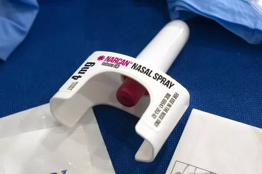 A container of Narcan, a brand name version of the opioid overdose-reversal drug naloxone, sits on a table following a demonstration at the Health and Human Services Humphrey Building on Friday, Sept. 8, 2023, in Washington. The number of U.S. fatal overdoses fell in 2023 — for only the second time since the current national epidemic of drug deaths began more than three decades ago. The Centers for Disease Control and Prevention posted the numbers on Wednesday, May 15, 2024. (AP Photo/Mark Sch