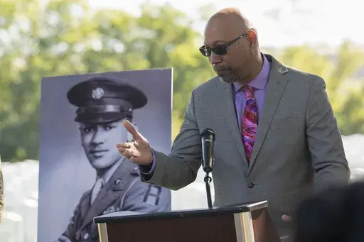 Steve Woodson speaks during a medal ceremony for his father, Cpl. Waverly B. Woodson Jr., to be posthumously honored with the Bronze Star and Combat Medic Badge, Oct. 11, 2023 at Arlington National Cemetery in Arlington, Va. Woodson Jr., a medic who was part of the only Black combat unit to take part in the D-Day invasion of France, is being posthumously awarded the Distinguished Service Cross. It's the military's second highest honor. The announcement was made Monday, June 3, 2024, by Sen. Chri