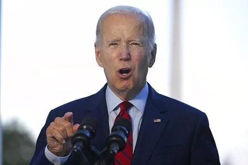 President Joe Biden speaks from the Blue Room Balcony of the White House Monday, Aug. 1, 2022, in Washington, as he announces that a U.S. airstrike killed al-Qaida leader Ayman al-Zawahri in Afghanistan. One year after ending the war in Afghanistan, Biden and top national security officials speak less about counterterrorism and more about the political, economic, and military threats posed by China as well as Russia. (Jim Watson/Pool via AP, File)