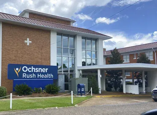 A sign on an Ochsner Rush Health building in Meridian, Miss, is seen in this photo taken on Monday, Aug. 1, 2022 after it was announced that Rush Health Systems officially merged with Ochsner Health. Ochsner operates 40 hospitals and more than 300 health and urgent care centers across Louisiana, Mississippi and the Gulf South. (Bill Graham/The Meridian Star via AP)