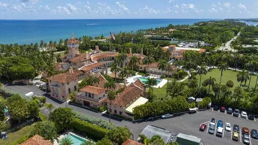 Former President Donald Trump's Mar-a-Lago club is seen in the aerial view in Palm Beach, Fla., Aug. 31, 2022. A federal appeals court has halted an independent review of documents seized from the estate, removing a hurdle the Justice Department said had delayed its criminal investigation into the retention of top secret government information. (AP Photo/Steve Helber, File)