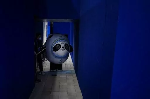 Bing Dwen Dwen, the Olympics mascot walks at the curling venue ahead of the Beijing Winter Olympics, Feb. 2, 2022, in Beijing. (AP Photo/Brynn Anderson)