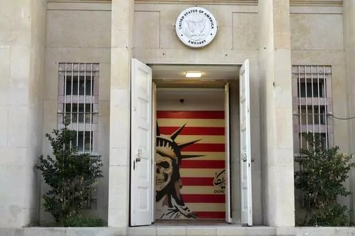 The entrance to the former U.S. Embassy, which has been turned into an anti-American museum, is seen in Tehran, Iran, on Saturday, Aug. 19, 2023. U.S. porn actor Whitney Wright, who has advocated for Palestinians online during Israel's war on Hamas, traveled to Iran in Feb. 2024 and visited the former U.S. Embassy in Tehran abandoned after the 1979 hostage crisis. The visit by Wright has sparked heated criticism over the country's crackdown on women since the 2022 death in police custody of Mahs