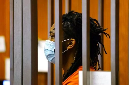 Dandrae Martin makes his first court appearance in Sacramento County Superior Court, in Sacramento, Calif., Tuesday, April 5, 2022. Martin is facing charges connected to the shooting that killed and injured multiple people in Sacramento days earlier. He was arrested as a "related suspect," on charges of assault with a deadly weapon and being a convict carrying a loaded gun. (AP Photo/Rich Pedroncelli)