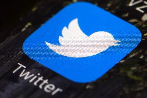 In this April 26, 2017, file photo is a Twitter app icon on a mobile phone in Philadelphia. If Elon Musk and Twitter get their way, the company will soon be privately held and under his control. The most obvious immediate change would likely be Twitter's stock being taken off the New York Stock Exchange. (AP Photo/Matt Rourke, File)