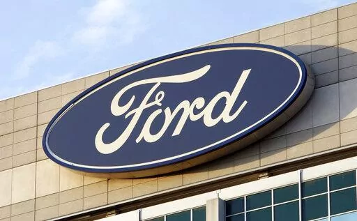 In this Oct. 26, 2009 photo, the Ford logo is seen on the automaker's headquarters in Dearborn, Mich. A Georgia jury has returned a $1.7 billion verdict against Ford Motor Co. involving a pickup truck crash that claimed the lives of a Georgia couple. Lawyers for the couple confirmed the verdict. Jurors in Gwinnett County returned the verdict late last week in the civil case involving what the plaintiffs’ lawyers called dangerously defective roofs on Ford pickup trucks. Melvin and Voncile Hill 