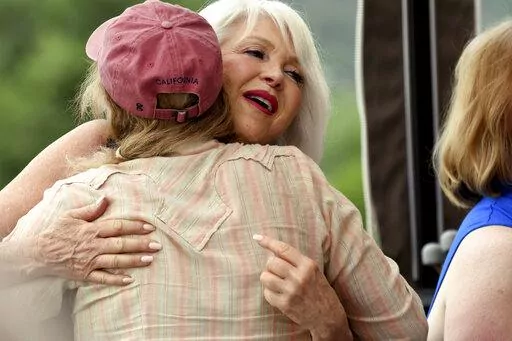 Tina Peters, a candidate for Colorado Secretary of State, meets with supporters at her election watch party in Sedalia, Colo., Tuesday, June 28, 2022. (AP Photo/Thomas Peipert)