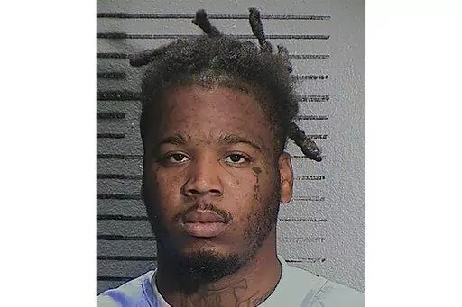 This Feb. 6, 2022, booking photo provided by the California Department of Corrections and Rehabilitation shows Smiley Allen Martin, two days before he was released to Sacramento County probation for his sentence on charges of corporal injury and assault likely to cause great bodily injury. Martin was arrested Tuesday, April 5, 2022, in connection with a mass shooting that killed six people in Sacramento, Calif. Martin is the brother of Dandrae Martin, the first suspect taken into custody in the 