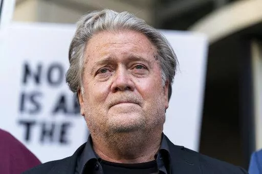 Former White House strategist Steve Bannon, pauses as he departs federal court on Friday, July 22, 2022, in Washington. Bannon, a longtime ally of former President Donald Trump has been convicted of contempt charges for defying a congressional subpoena from the House committee investigating the Jan. 6 insurrection at the U.S. Capitol. (AP Photo/Alex Brandon)