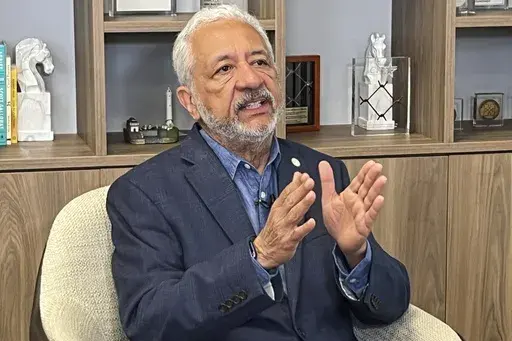Panama Canal Administrator Ricaurte Vásquez addresses President-elect Donald Trump's suggestion that the U.S. should retake control of the Panama Canal during an interview with Associated Press in his office Friday, Jan. 10, 2025, in Panama City, Panama. (AP Photo/Abraham Terán)