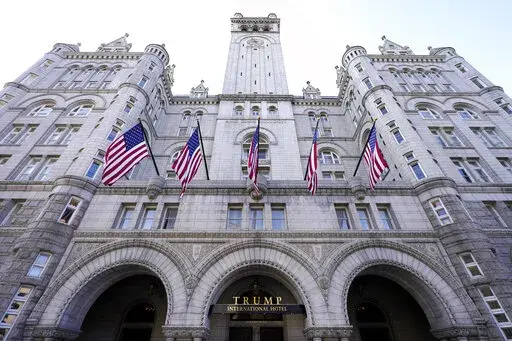 A view of The Trump International Hotel is seen, March 4, 2021, in Washington. Former President Donald Trump’s businesses and inaugural committee have reached a deal to pay Washington, D.C., $750,000 to resolve a lawsuit that alleged the committee overpaid for events at the Trump International Hotel and enriched the former president’s family in the process. That's according to the District of Columbia’s attorney general. (AP Photo/Julio Cortez, file)