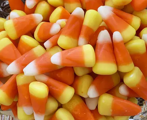 This image shows a pile of candy corn in Westchester County, N.Y., Oct. 23, 2023. (AP Photo/Julia Rubin, File)