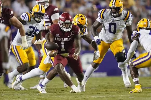 Arkansas quarterback KJ Jefferson (1) fumbles in the second half of an NCAA college football game against LSU in Baton Rouge, La., Saturday, Sept. 23, 2023. LSU won 34-31. (AP Photo/Gerald Herbert)