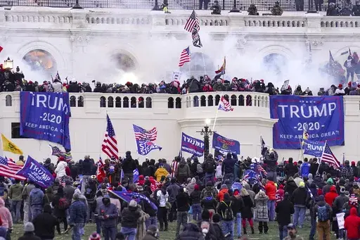 Rioters loyal to President Donald Trump storm the Capitol, Jan. 6, 2021, in Washington. (AP Photo/John Minchillo, File)