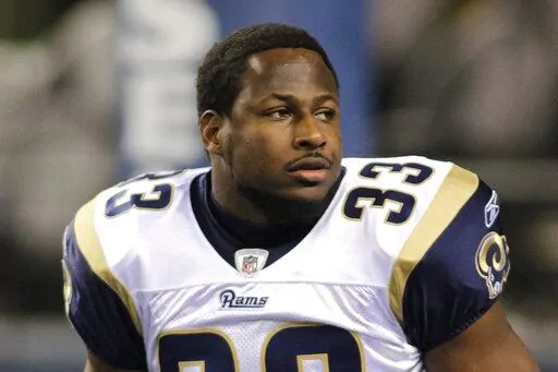 St. Louis Rams Carnell "Cadillac" Williams is shown during warm ups before the first half of an NFL football game against the Seattle Seahawks, Monday, Dec. 12, 2011, in Seattle. Carnell Williams was an All-American running back on Auburn's undefeated team in 2004. Now, the former NFL rookie of the year is running the show. Williams is serving as Auburn's interim coach for the last four games, starting Saturday at Mississippi State. He replaces Bryan Harsin, who was fired Monday, Oct. 31, 2022, 