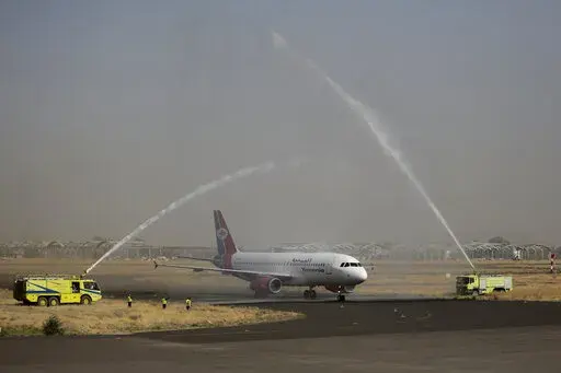A Yemen Airways plane, the first commercial flight in six years from Yemen's rebel-held capital is greeted with a water spray salute at the Sanaa international airport, part of a fragile truce in the county's grinding civil war, in Sanaa, Yemen, May, 16, 2022. U.N. Special Envoy for Yemen Hans Grundberg said in a statement June 2, 2022, that Yemen’s warring parties have agreed to renew the nationwide truce for another two months, a rare spot of good news for a country plagued by eight years of