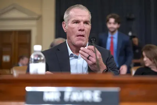 Former NFL quarterback Brett Favre appears before the House Committee on Ways and Means on Capitol Hill, Tuesday, Sept. 24, 2024, in Washington. (AP Photo/Mark Schiefelbein)
