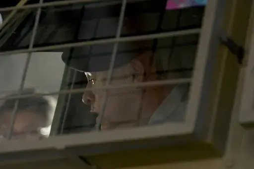 Bolivia's general commander of the Army, Juan José Zúñiga, sits inside an armored vehicle parked on Plaza Murillo, outside government palace in La Paz, Bolivia, Wednesday, June 26, 2024. Armored vehicles rammed into the doors of the government palace Wednesday as President Luis Arce said the country faced an attempted coup. (AP Photo/Juan Karita)