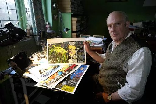 Martin Rowson shows Britain's Prime Minister Boris Johnson cartoons as he poses for a photographer in his studio in London, Monday, Jan. 24, 2022. So the bad news besetting British Prime Minister Boris Johnson over allegations of lockdown-breaching government parties has been good news for Britain's humorists, producing an outpouring of satirical responses. Political cartoonist Martin Rowson says mockery is one of the trade-offs in democratic societies between government and governed: “They ha