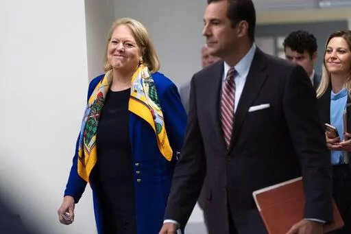 Conservative activist Virginia "Ginni" Thomas, walks during a break in a voluntary interview with the House panel investigating the Jan. 6 insurrection, at Thomas P. O'Neill Jr. House Office Building, Thursday, Sept. 29, 2022, in Washington. The committee has for months sought an interview with Thomas in an effort to know more about her role in trying to help former President Donald Trump overturn his election defeat. She texted with White House chief of staff Mark Meadows and contacted lawmaker