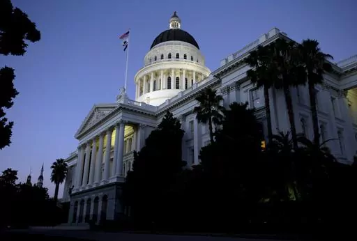 The dome of the California Capitol glows in the early evening, Aug. 31, 2016, in Sacramento, Calif. On Friday, Sept. 8, 2023, Democratic California lawmakers approved a bill that would instruct courts to consider, among many other factors, whether a parent affirms a child’s gender identity when making custody and visitation decisions. But critics online are claiming that the measure goes much further, and means any parent who doesn’t support their kid’s desire to pursue gender-affirming su