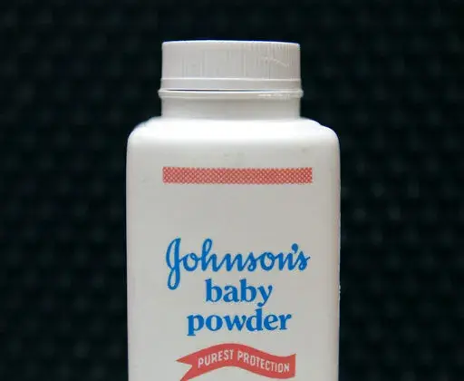 In this April 15, 2011 file photo, a bottle of Johnson's baby powder is displayed in San Francisco. Johnson & Johnson is pulling its iconic, talc-based Johnson’s Baby Powder from shelves worldwide next year in favor of a product based on cornstarch. The health care giant’s announcement Friday, Aug. 12, 2022, comes two years after it ended talc-based powder sales in the U.S. and Canada, where demand has dwindled amid thousands of lawsuits claiming it had caused cancer (AP Photo/Jeff Chiu, Fil