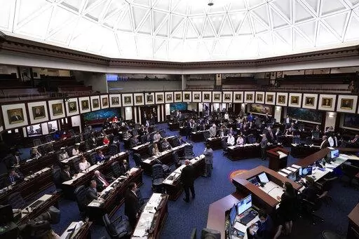 Members of the Florida House of Representatives convene during a legislative session April 30, 2021, at the Capitol in Tallahassee, Fla. On Tuesday, Feb. 22, 2022, Florida House Republicans advanced a bill, dubbed by opponents as the “Don’t Say Gay” bill, to forbid discussions of sexual orientation and gender identity in schools, rejecting criticism from Democrats who said the proposal demonizes LGBTQ people. (AP Photo/Wilfredo Lee, File)