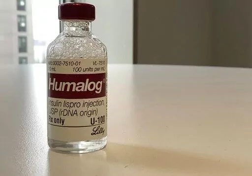 This Wednesday, March 1, 2023 photo shows a vial of Eli Lilly's Humalog insulin in New York. Eli Lilly will cut prices for some older insulins later this year and immediately give more patients access to a cap on costs they pay to fill prescriptions. The moves announced March 1, 2023 promise critical relief to some people with diabetes who can face annual costs of more than $1,000 for insulin they need in order to live. Lilly’s changes also come as lawmakers and patient advocates pressure drug