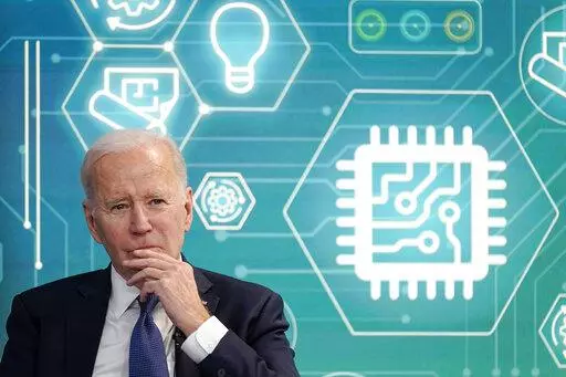 President Joe Biden attends an event to support legislation that would encourage domestic manufacturing and strengthen supply chains for computer chips in the South Court Auditorium on the White House campus, March 9, 2022, in Washington. Biden is working to create a manufacturing revival, even helping to put factory jobs in Republican territory under the belief it can restore faith in U.S. democracy. (AP Photo/Patrick Semansky, File)