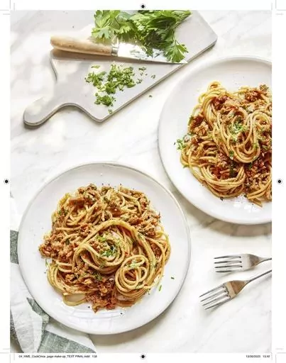 This image released by Yellow Kite shows a recipe for Spicy Sun-Dried Tomato and Eggplant Ragu from the cookbook “Healthy Made Simple” by Ella Mills. (Clare Winfield/ Yellow Kite via AP)