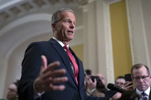 Senate Majority Leader John Thune, R-S.D., speaks to reporters after meeting with Vice President JD Vance and fellow Republicans to discuss President Donald Trump's agenda at a luncheon, at the Capitol in Washington, Wednesday, Feb. 19, 2025. (AP Photo/J. Scott Applewhite)