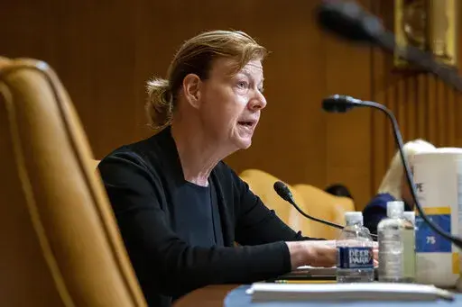 Sen. Tammy Baldwin, D-Wis., speaks during the Senate Appropriations Committee Subcommittee on Defense, May 3, 2022, on Capitol Hill in Washington. Democrats are punting a vote to protect same-sex and interracial marriages until after the November midterm elections. The request for a delay by senators who have been pushing for the legislation comes after Baldwin, the lead senator on the legislation, had predicted that they would be able to get the 10 Republican votes they need to break a filibust