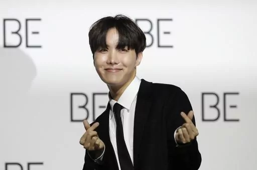 A member of South Korean K-pop band BTS J-Hope poses for photographers during a press conference to introduce their new album "BE" in Seoul, South Korea, Nov. 20, 2020. J-Hope entered a South Korean boot camp Tuesday, April 18, 2023 to start his 18-month compulsory military service, becoming the group’s second member to join the country's army. (AP Photo/Lee Jin-man, File)