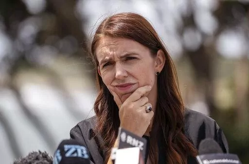 New Zealand Prime Minister Jacinda Ardern speaks about the COVID-19 situation while visiting New Plymouth on Thursday, Jan. 20, 2022. New Zealand is among the few remaining countries to have avoided any outbreaks of the omicron variant — but Prime Minister Jacinda Ardern said Thursday an outbreak was inevitable and the nation would tighten restrictions as soon as one was detected. (Mark Mitchell/New Zealand Herald via AP)