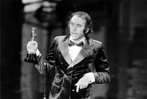Producer Albert S. Ruddy accepts the Oscar for best picture for "The Godfather" at the 45th Annual Academy Awards ceremony in Los Angeles, Calif., on March 27, 1973. The Canadian-born producer and writer who won Oscars for “The Godfather” and “Million Dollar Baby,” died Saturday, May 25, 2024, at age 94. (AP Photo, File)