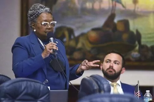 Rep. Yvonne Hayes Hinson, D-Gainesville voices her opposition to Senate Bill 2-C: Establishing the Congressional Districts of the State in the House of Representatives Thursday, April 21, 2022 at the Capitol in Tallahassee, Fla. Moments later, the session was halted on a protest by Democrats, but continued after a brief recess. (AP Photo/Phil Sears)