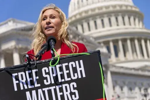 U.S. Rep. Marjorie Taylor Greene, R-Ga., speaks about Twitter,  April 28, 2022, on Capitol Hill in Washington. On Monday July 25, 2022, a judge in Atlanta has rejected an appeal by a group of voters and affirmed the Georgia secretary of state’s decision that U.S. Rep. Marjorie Taylor Greene is eligible to run for reelection. The voters said she played a big role in the Jan. 6, 2021, attack on the U.S. Capitol and was therefore ineligible for reelection. (AP Photo/Jacquelyn Martin, File)