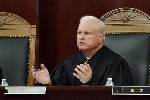Arizona Supreme Court Chief Justice Robert M. Brutinel speaks during oral arguments, in Phoenix on April 20, 2021. Arizona victims of long-ago child sex abuse can proceed with lawsuits against groups like the Boy Scouts of America following a recent decision by the state Supreme Court that rejected claims that a 2019 state law extending victims' right to sue was unconstitutional. (AP Photo/Matt York, File)