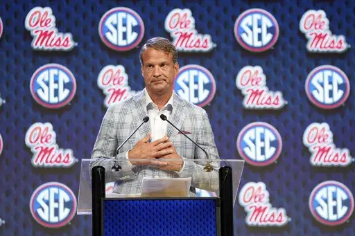 Ole Miss head football coach Lane Kiffin speaks during the Southeastern Conference NCAA college football media days Monday, July 15, 2024, in Dallas. (AP Photo/Jeffrey McWhorter)