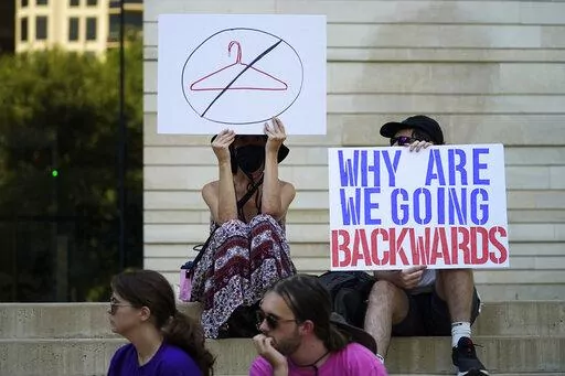 Demonstrators gather at the federal courthouse following the Supreme Court's decision to overturn Roe v. Wade, June 24, 2022, in Austin, Texas. Some opponents of the decision are feeling despair over the historic rollback of the 1973 case Roe V. Wade legalizing abortion. If a right so central to the overall fight for women’s equality can be revoked, they ask, what does it mean for the progress women have made in public life in the intervening 50 years? (AP Photo/Eric Gay, File)