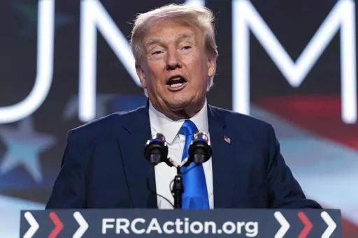 Former President Donald Trump speaks during the Pray Vote Stand Summit, Friday, Sept. 15, 2023, in Washington. Trump repeatedly declined in an interview aired Sunday, Sept. 17, 2023, to answer questions about whether he watched the Capitol riot unfold on television, saying he would “tell people later at an appropriate time.” (AP Photo/Jose Luis Magana, File)
